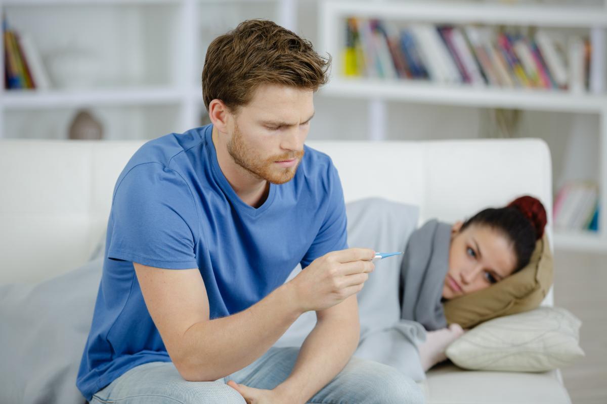 man struggles with signs of alcohol overdose