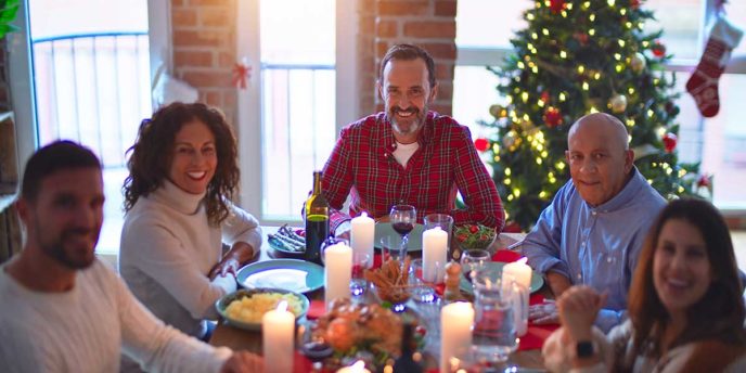 group going through alcohol addiction recovery during the holidays