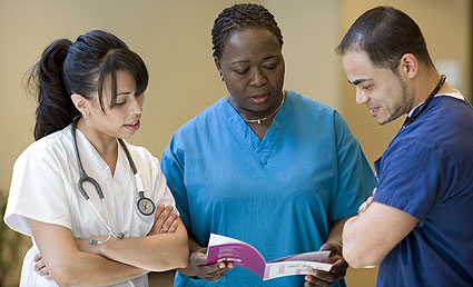 DoctorAndNursesDiscussingPamphlet