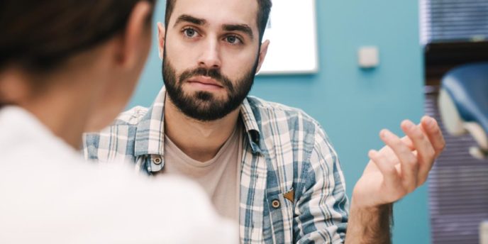 man begins opioid addiction treatment at methadone clinic