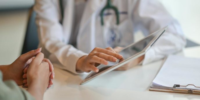 How Does Vivtrol Treatment Work_ man discusses vivitrol treatment with doctor