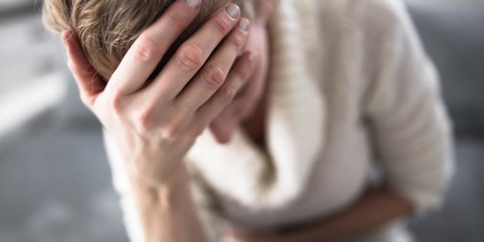 Signs of Heroin Overdose woman struggles with signs of heroin overdose