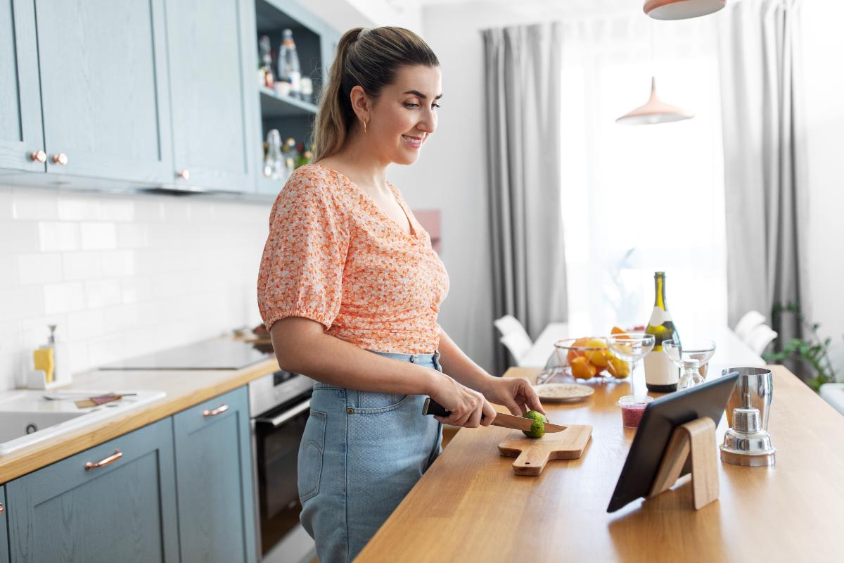 woman prepares mocktails for sober holidays